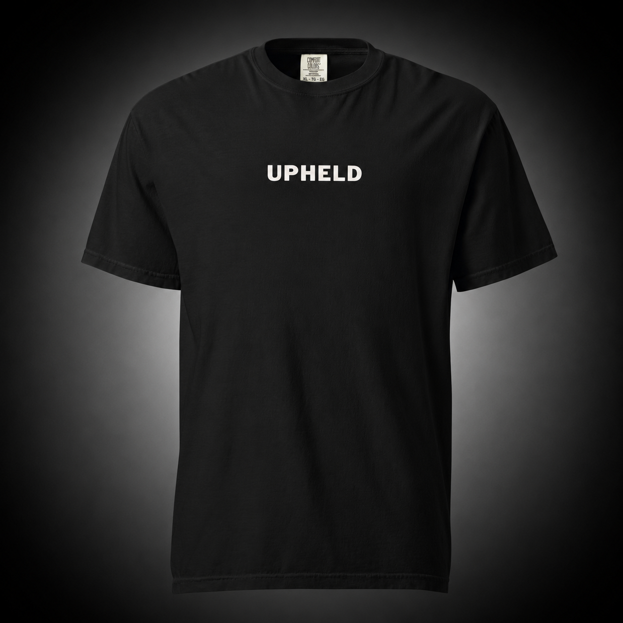 Upheld Christian T-Shirt featuring Isaiah 41:10 Bible verse on a premium black cotton tee