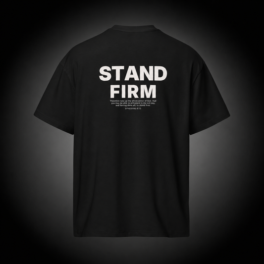 Unyielding Christian T-Shirt featuring Ephesians 6:13 Bible verse "Stand Firm" design on a premium black cotton tee